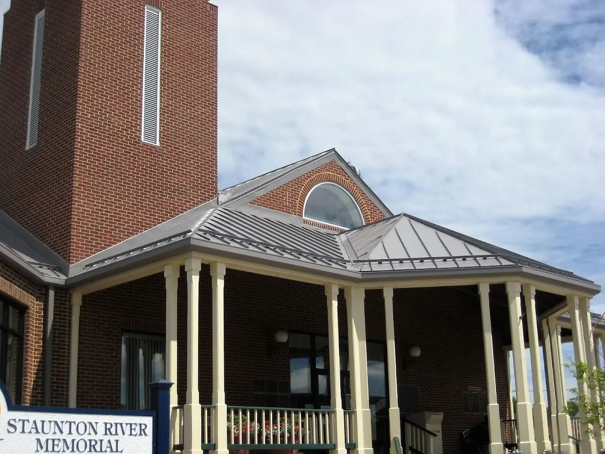 Skilled roofing craftsmen working on a residential roof in Downtown Smyrna